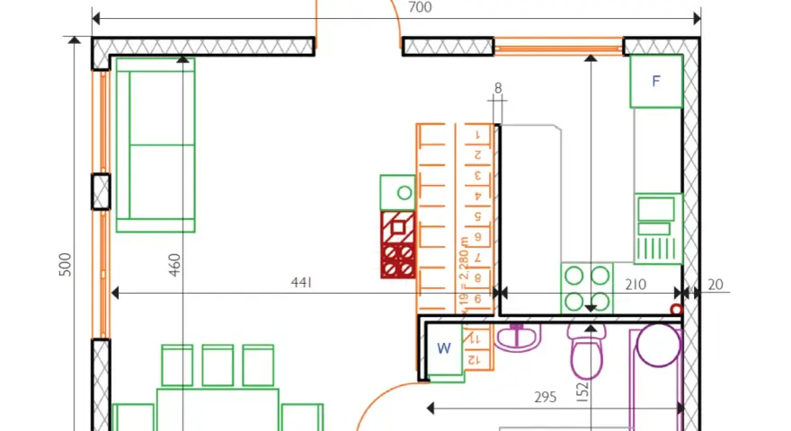 Projekt funkcjonalnego domu 35m2: salon z kanapą, kuchnia, łazienka z wanną i WC, szafy.